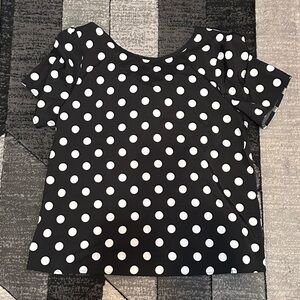 Women’s Black and White Polka Dot Top with bow detail on back size medium.